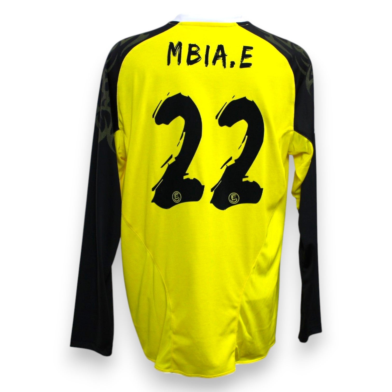 Retro maglia Siviglia FC Third 2013-14 Player Issued Stéphane M'Bia numero 22 – Warrior maniche lunghe – cognome MBIA.E – giallo nero – stagione UEFA Europa League vinta