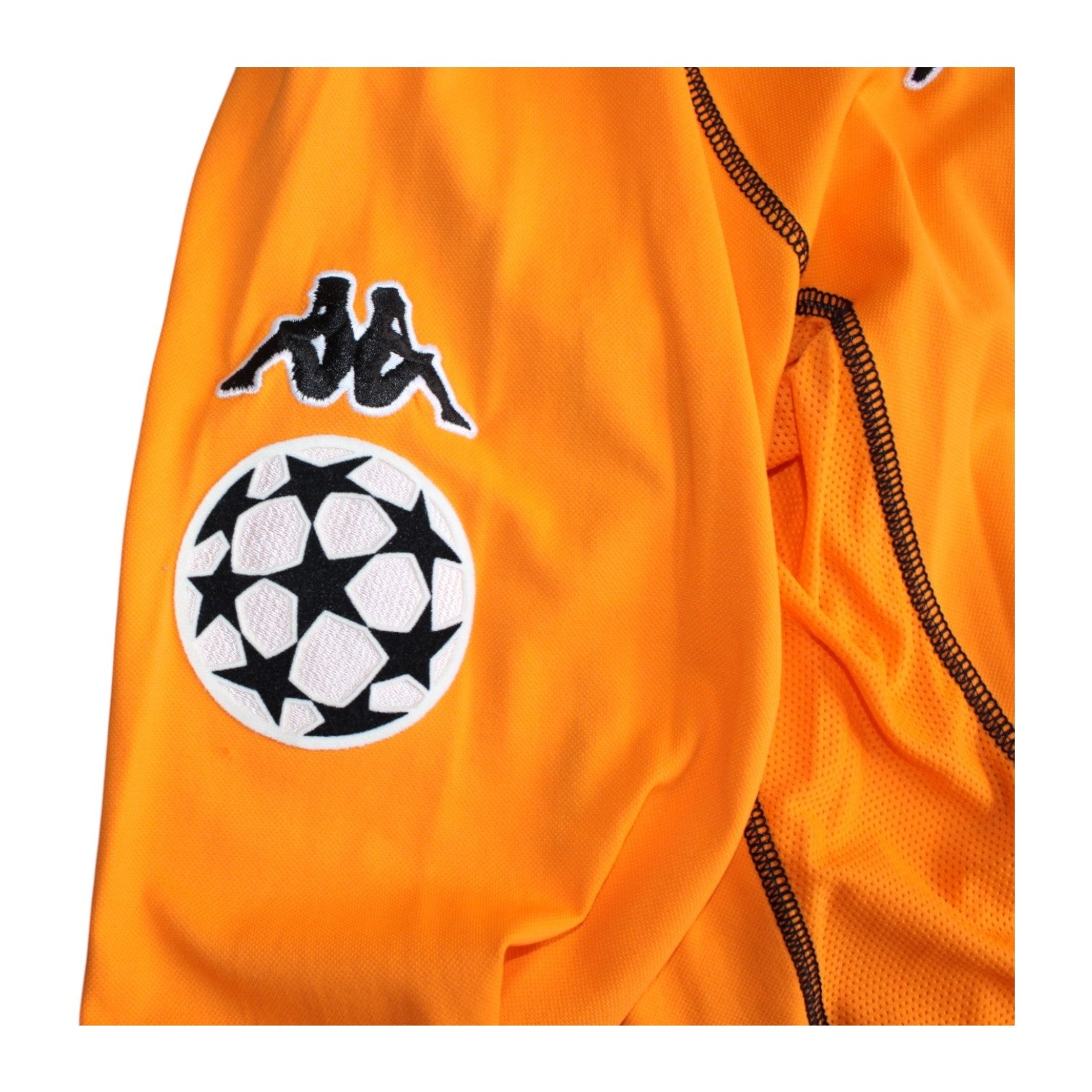 Dettaglio patch ufficiale UEFA Champions League "Starball" integra su manica maglia Roma 2002-03 versione Player Issued