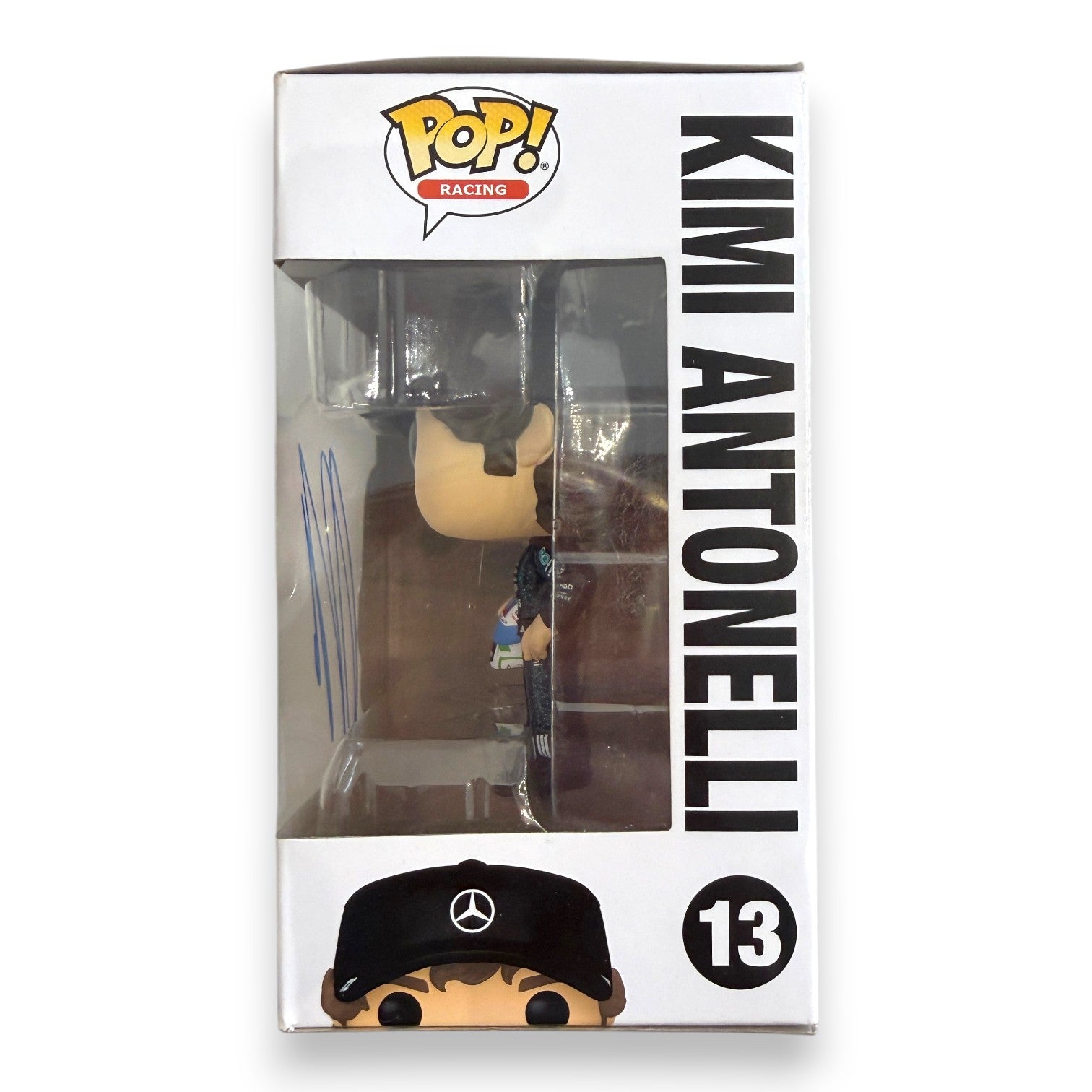 Dettaglio autografo Kimi Antonelli su finestra trasparente Funko POP – pennarello blu nitido – cimelio Formula 1 Mercedes 2025