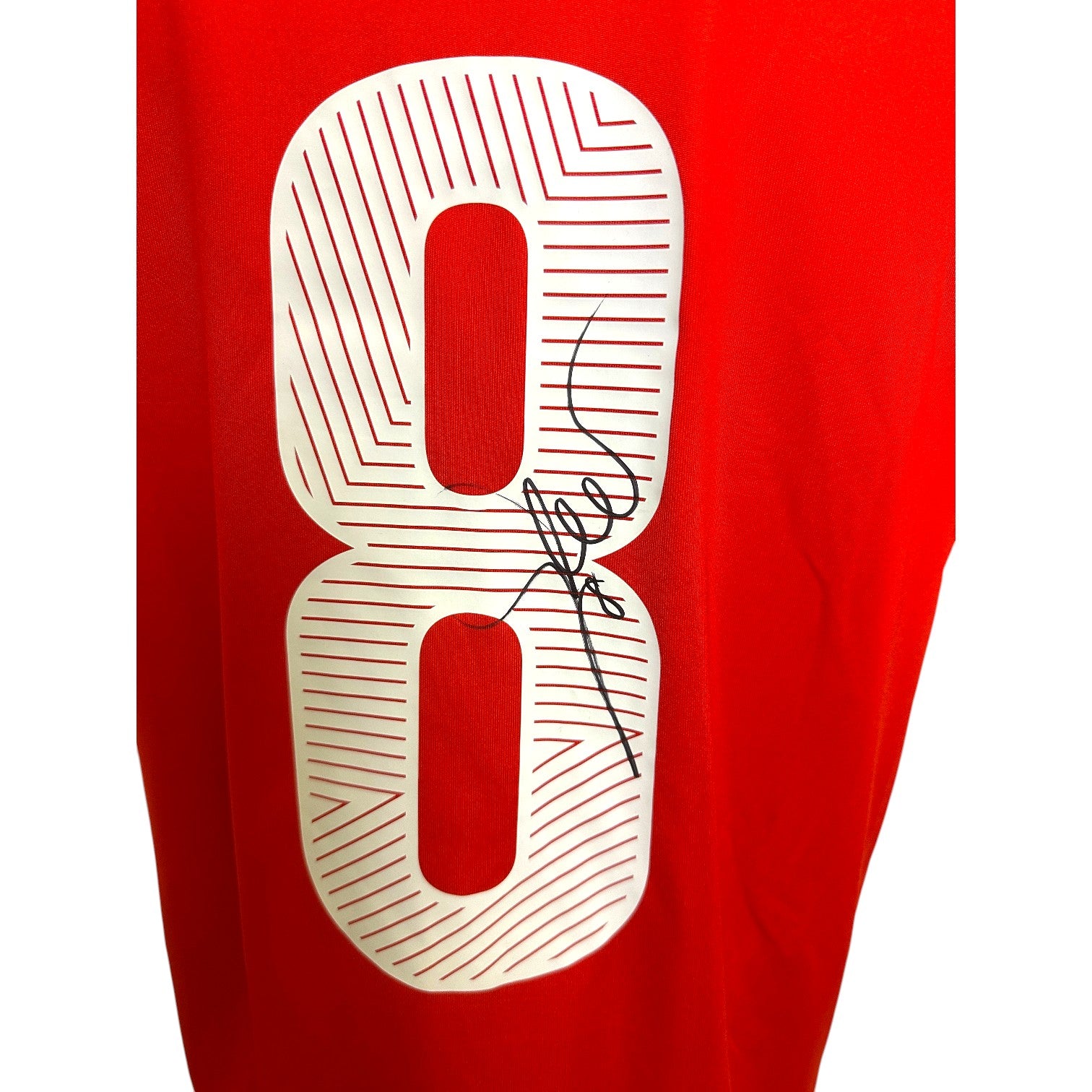 Dettaglio autografo originale Gökhan Inler maglia Svizzera Mondiale 2010 sul numero 8 – COA Associazione Autografia incluso
