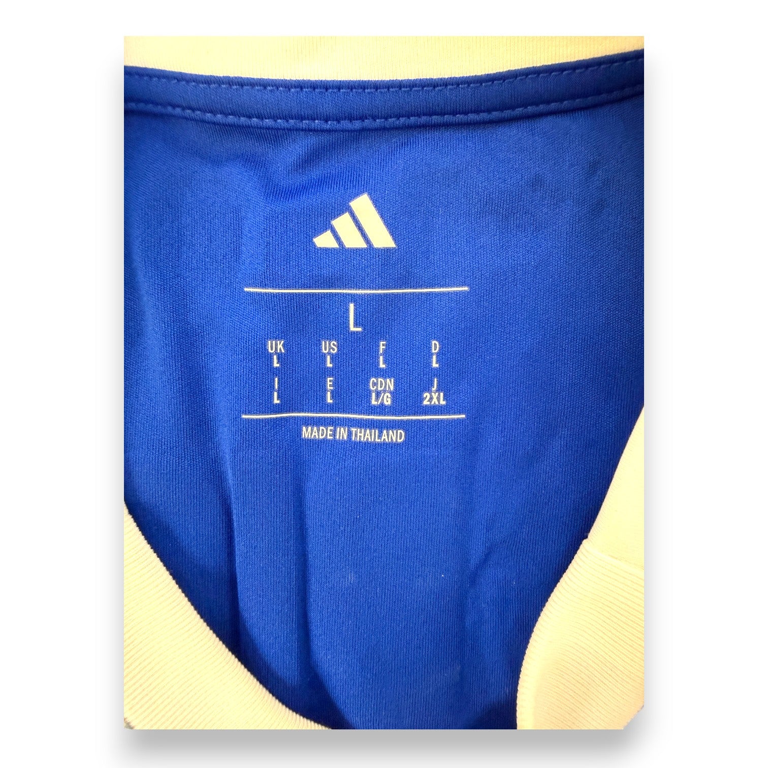 Etichetta interna adidas taglia L maglia Como Home 2025-26 – Made in Thailand