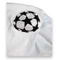 Dettaglio patch UEFA Champions League maglia Zenit 2020-21 – pallone stelle bianco nero – fornitura gara UCL Gruppo H stagione 2020-21