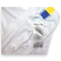 Dettaglio etichetta lavaggio interna maglia Hellas Verona Third 2019-20 Macron – codice identificativo "ID 320" e indicazione "MADE IN CHINA" in multi-lingua – elemento tecnico per verifica autenticità Player Issued