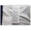 Etichetta composizione maglia Italia Away Player Issued 2016 – Puma ZA Import Code – istruzioni lavaggio multilingua