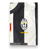 Dettaglio fronte maglia Juventus Home 2014-15 Player Issued – stemma Juventus e scritta "30 Sul Campo" – Nike Dri-Fit