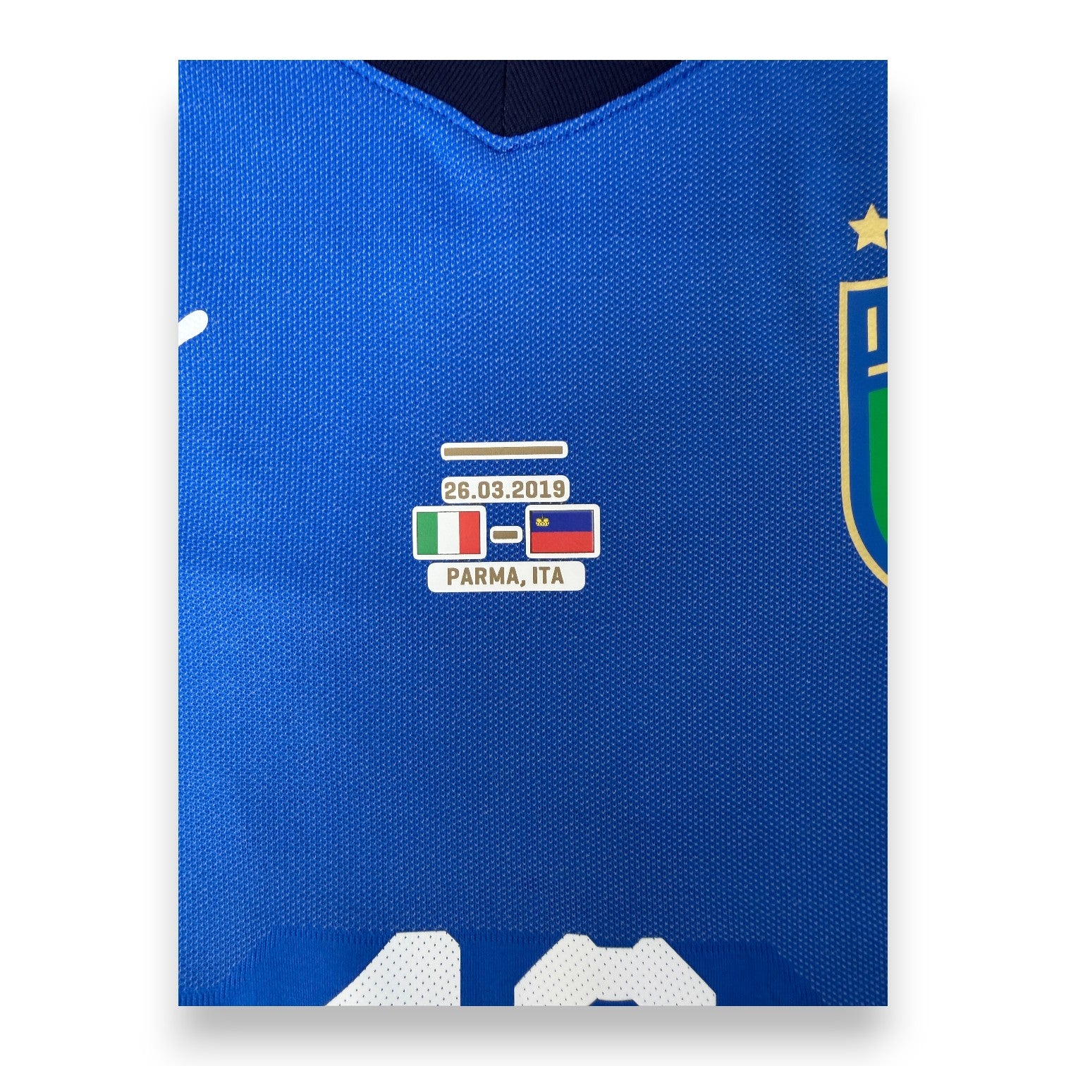 Dettaglio stampa patch gara Italia-Liechtenstein 26.03.2019 Parma – maglia Italia Puma Store