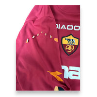 Dettaglio manica maglia Roma Home 2003-04 Diadora – stemma AS Roma – heat sensor arancione – difetto dichiarato