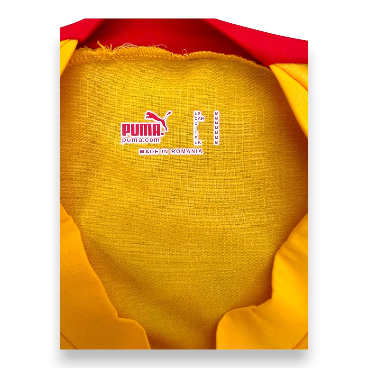 Etichetta interna Puma Made in Romania taglia M maglia Camerun 2018