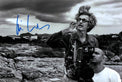 Fotografia autografata Wim Wenders regista sul set bianco e nero con macchina da presa Canon – autografo originale pennarello blu – 20x30 cm – condizioni Excellent