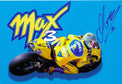 Fotografia autografata Max Biaggi cartolina ufficiale Honda Camel numero 3 piena piega sfondo azzurro scritta Max 3 gialla – autografo originale pennarello blu in alto a destra – 29,8x20,2 cm – condizioni Excellent