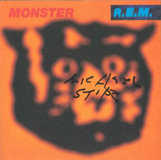 CD Monster R.E.M. autografato da Michael Stipe – copertina arancione firmata a pennarello nero – Warner 1994