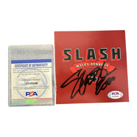 Copertina autografata Slash affiancata al Certificato di Autenticità PSA