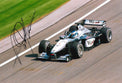 Fotografia autografata Mika Häkkinen – McLaren MP4-15 F1 stagione 2000 numero 1 campione del mondo in carica – livrea West Mercedes-Benz – autografo originale pennarello nero – formato 30x20 cm – COA incluso