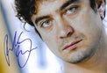 Fotografia autografata Riccardo Scamarcio primo piano estremo – autografo blu originale – MTM Memorabilia
