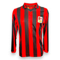 Maglia AC Milan 125 anniversario 2024-25 Store Puma – strisce rossonere retro – stemma 1899 – edizione limitata
