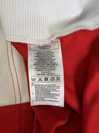 Etichetta lavaggio maglia Arsenal Home 2021-22 Adidas – Made in Georgia – 100% materiali riciclati Primegreen