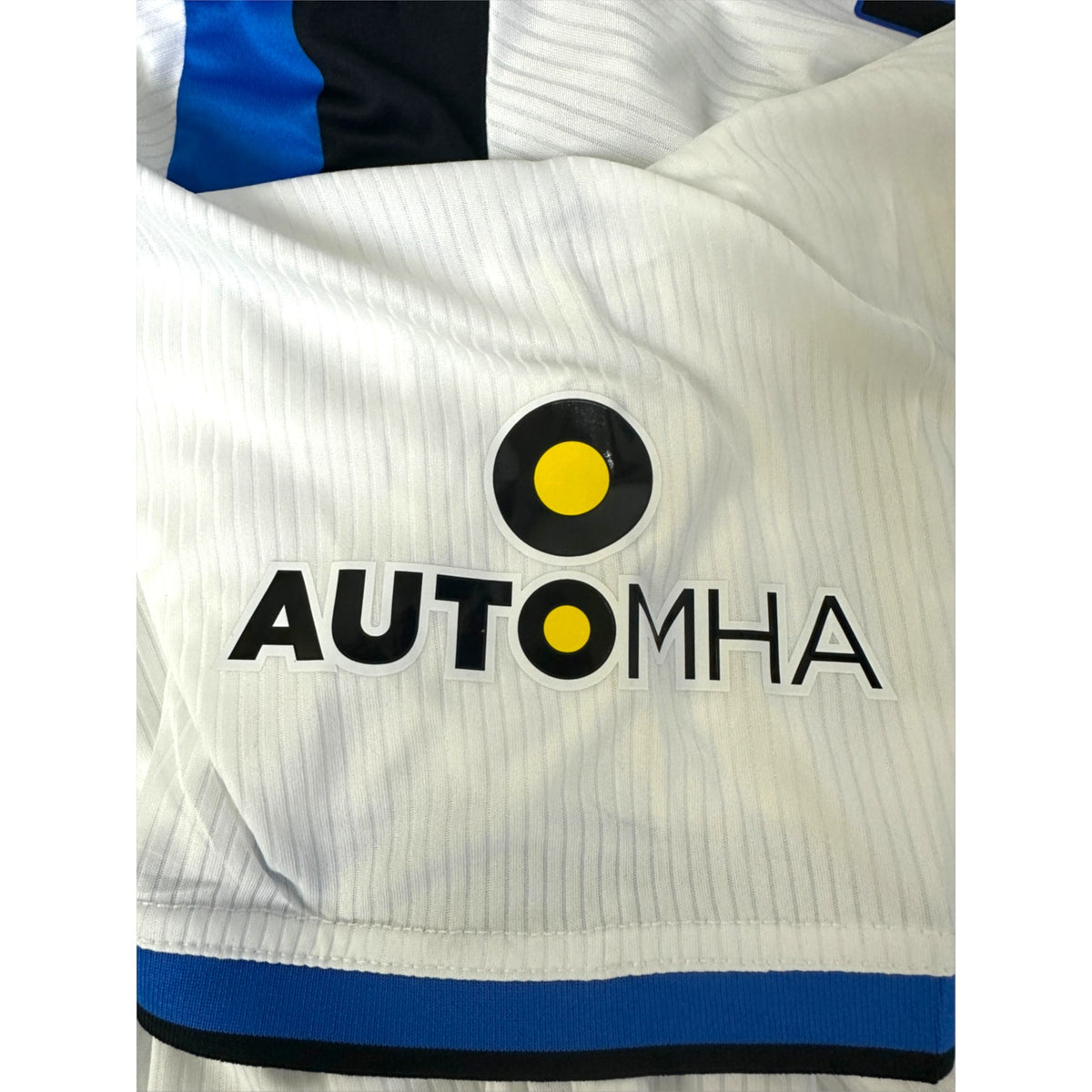 Dettaglio sponsor di manica Automha su maglia Atalanta Away 2021-22 Joma