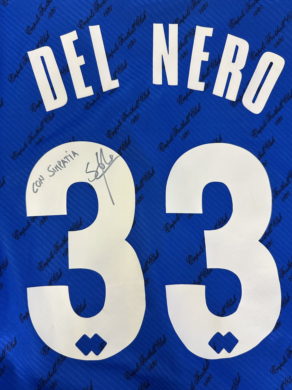 Primo piano numero 33, autografo e dedica "Con simpatia" di Simone Del Nero su maglia Empoli
