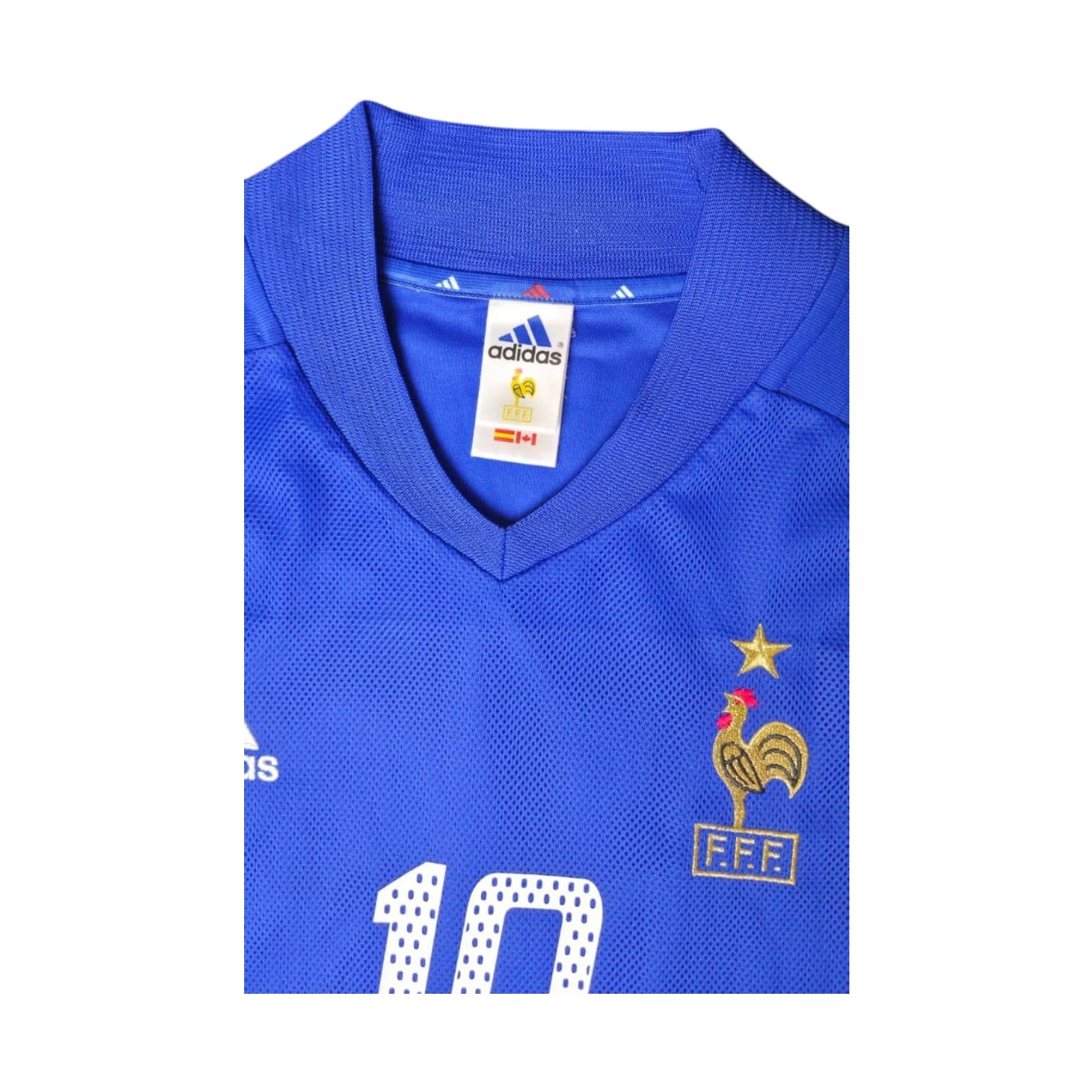 Colletto a V maglia Francia 2002 Adidas – stemma FFF gallo dorato con stella campioni del mondo