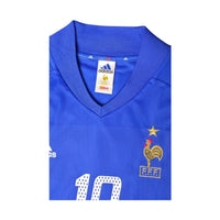 Colletto a V maglia Francia 2002 Adidas – stemma FFF gallo dorato con stella campioni del mondo
