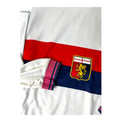 Stemma ricamato Genoa e polsino a righe rosa e blu – maglia Away 2008/09 Asics manica lunga