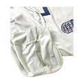Dettaglio interno maglia Inghilterra Home 2005/07 Umbro con numero 7 Beckham e stemma