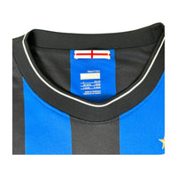 Etichetta Nike Fit Dry taglia L Made in Morocco con croce di Milano – maglia Inter Home 2009/10