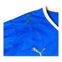 Dettaglio difetto spalla destra maglia Italia Home 2008 Puma – logo mancante con residuo di colla