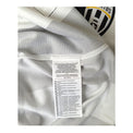Etichetta di composizione Nike Made in Bangladesh della maglia Juventus Home 2012/13