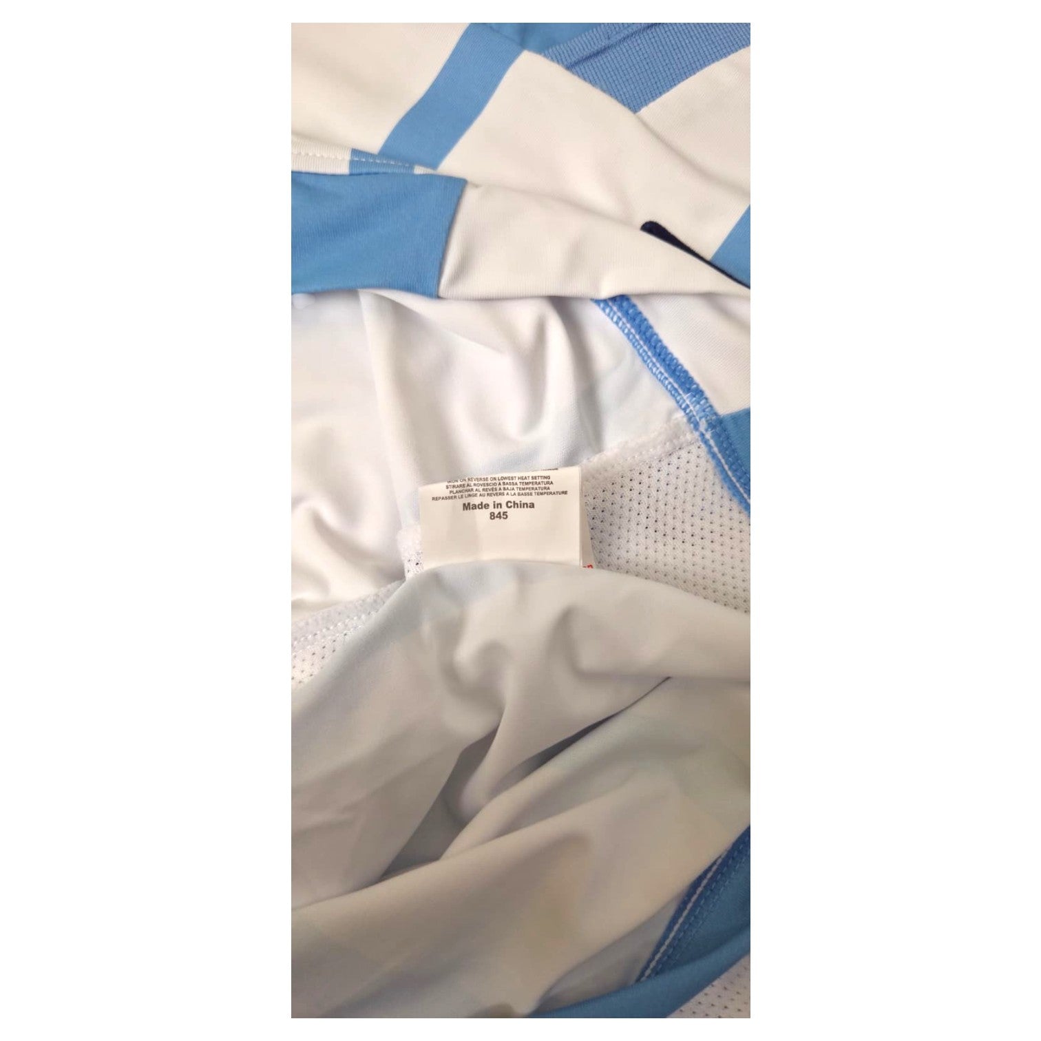 Etichetta interna maglia Lazio Away 2014-15 Macron – Made in China – istruzioni di lavaggio