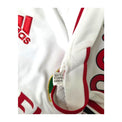 Cartellino Adidas con codice V13442 e data 07/11 della maglia Milan Away 2011/12