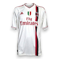 Maglia Milan Away 2011/12 Adidas bianca con banda rossonera, scudetto e sponsor Fly Emirates – fronte