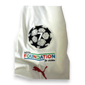 Patch Champions League e UEFA Foundation maglia Milan Away 2022-23 Puma