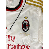Stemma AC Milan stella oro scritta Il club più titolato al mondo maglia Away 2013-14 Nocerino