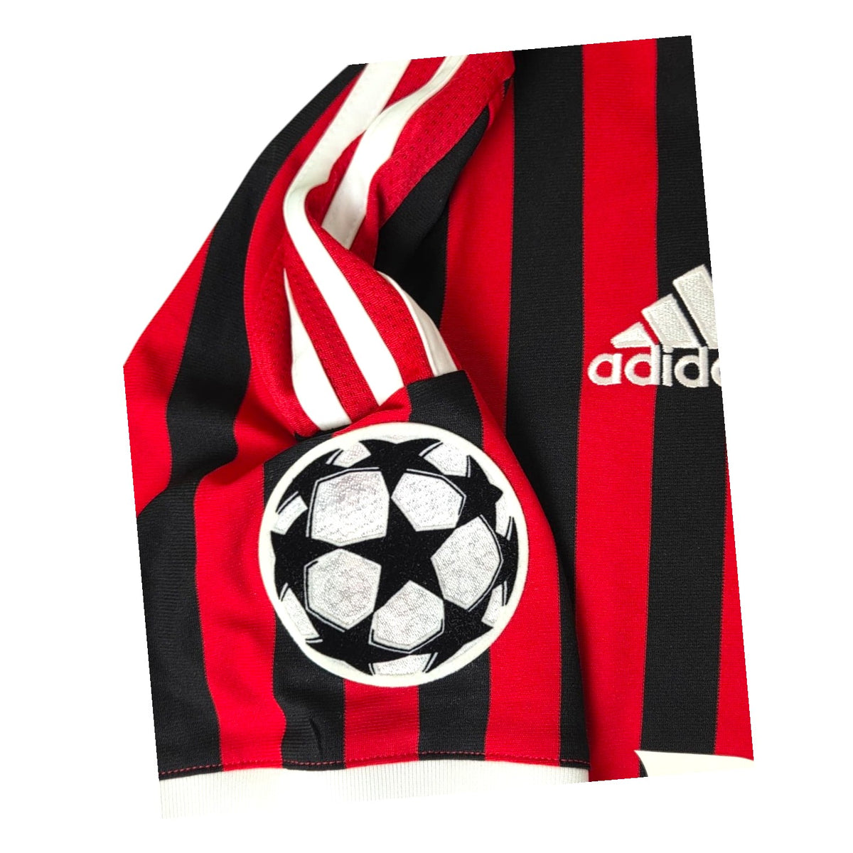 Patch Champions League Starball sulla manica della maglia Milan Home 2011/12