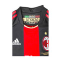 Colletto maglia Milan Home 2010-11 Adidas – etichetta AC Milan e stemma rossonero con stella