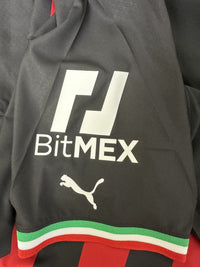 Dettaglio sponsor BitMEX manica maglia Milan Home 2022-23 Puma