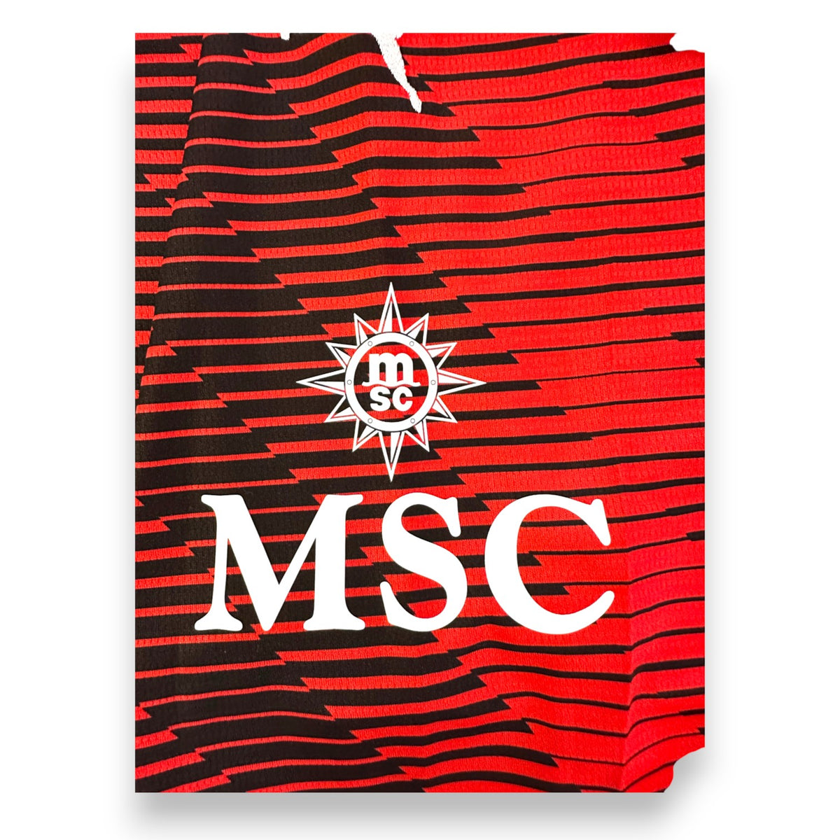 Dettaglio sponsor di manica MSC su maglia Milan Home 2023-24 Puma