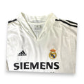 Colletto a V, logo Adidas e stemma Real Madrid ricamato – maglia Home 2004/05 Vintage