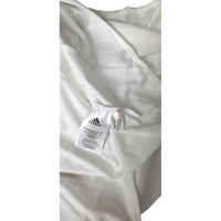 Dettaglio etichetta interna maglia Real Madrid 2004-05 Adidas – codice 09/04 Made in Morocco