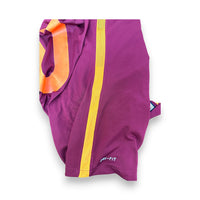 Inserto in rete arancio e logo Dri-Fit sul fianco della maglia Roma Home 2015/16