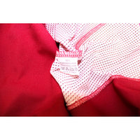 Dettaglio etichetta composizione interna maglia Torino FC Vintage 2001-2003 100% Poliestere Made in Italy simboli lavaggio retro mesh traforato granata