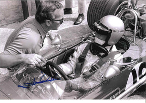 Fotografia autografata Mario Andretti debutto F1 Lotus 49B Gold Leaf Watkins Glen 1968 – vintage bianco e nero 30,5x20 cm – autografo originale pennarello blu – COA Associazione Autografia incluso