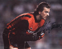 Fotografia autografata Stefano Tacconi portiere Juventus divisa arancione Kappa sponsor Ariston anni '80 – autografo originale pennarello nero – 29,5x21 cm – condizioni Excellent