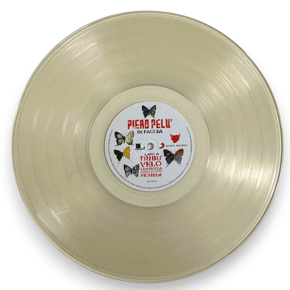 Vinile trasparente lato A In Faccia Piero Pelù con etichetta Sony Music Legacy