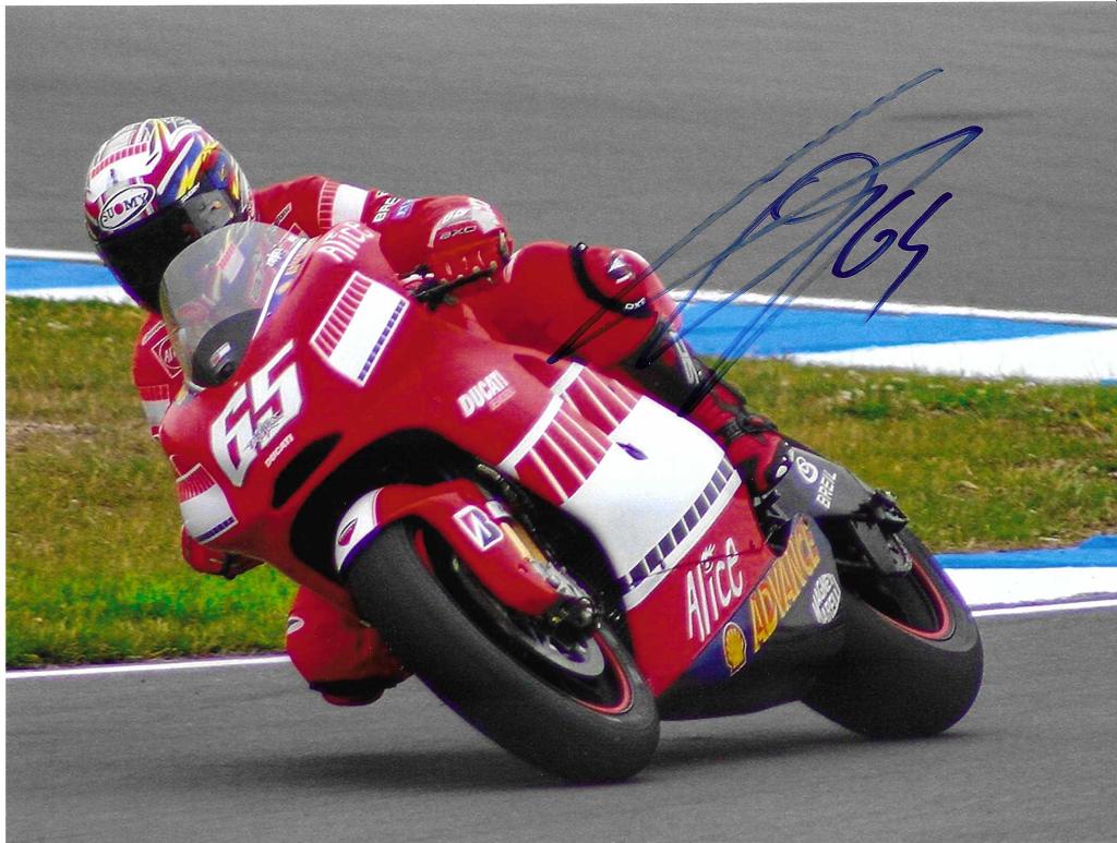 Autografo di Loris Capirossi Fotografia gara con Ducati Moto GP